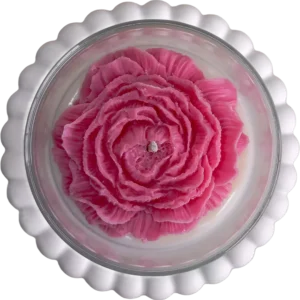 Soy wax candle with handcrafted flower in a glass jar